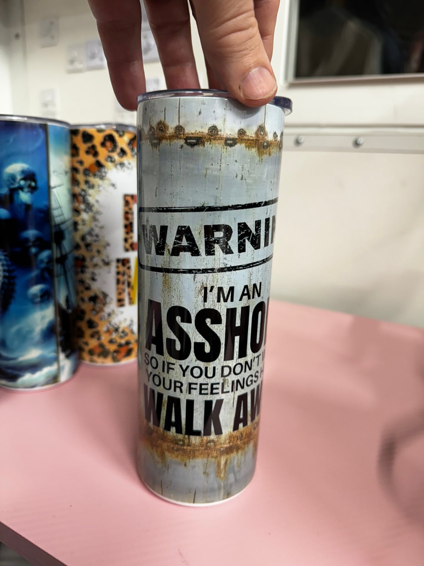 Warning tumbler