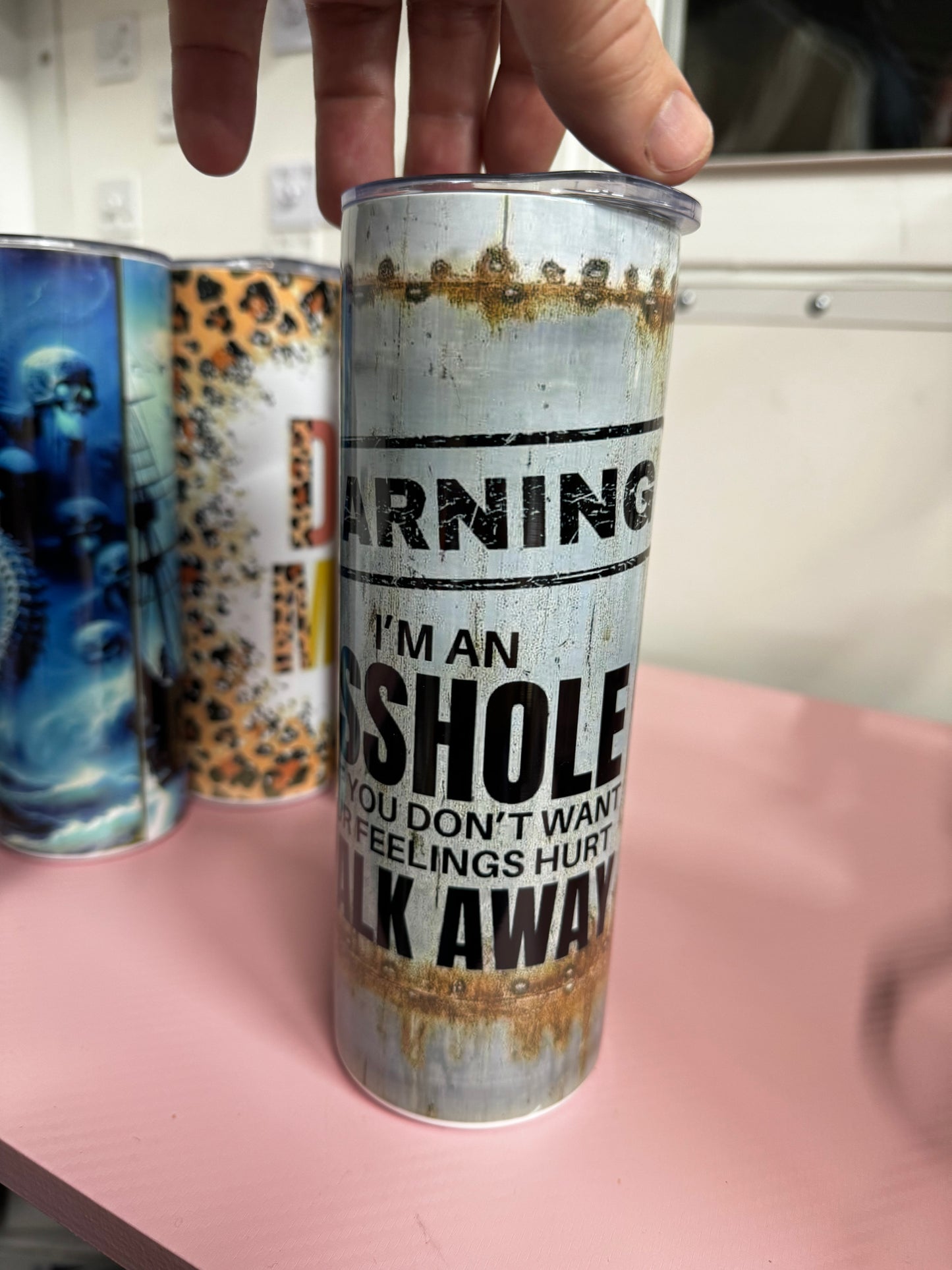 Warning tumbler