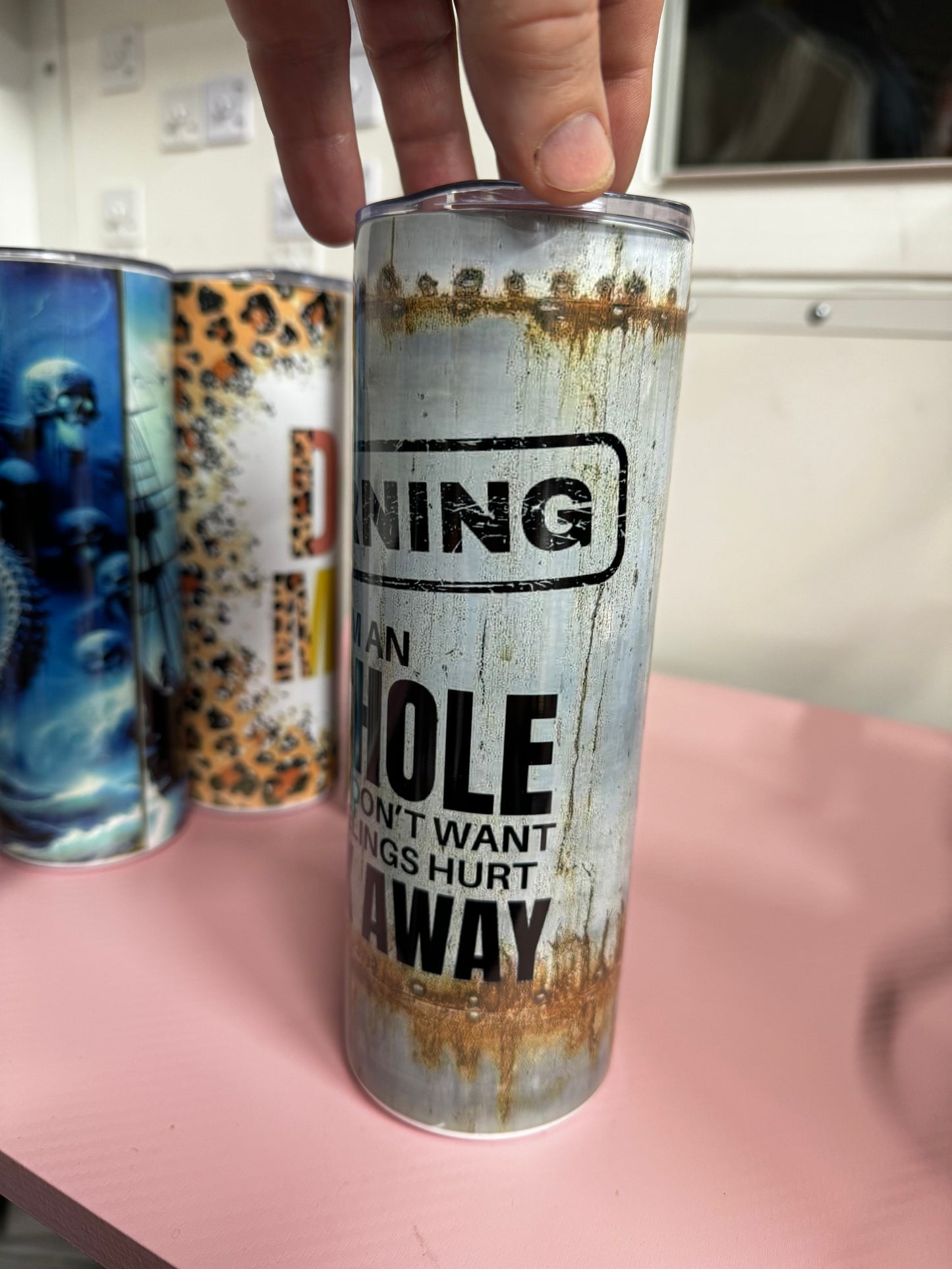 Warning tumbler